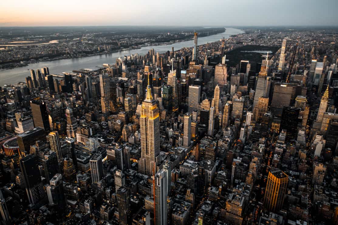 new-york-city-skyline-captured-from-air-at-golden-hour-above-manhattan