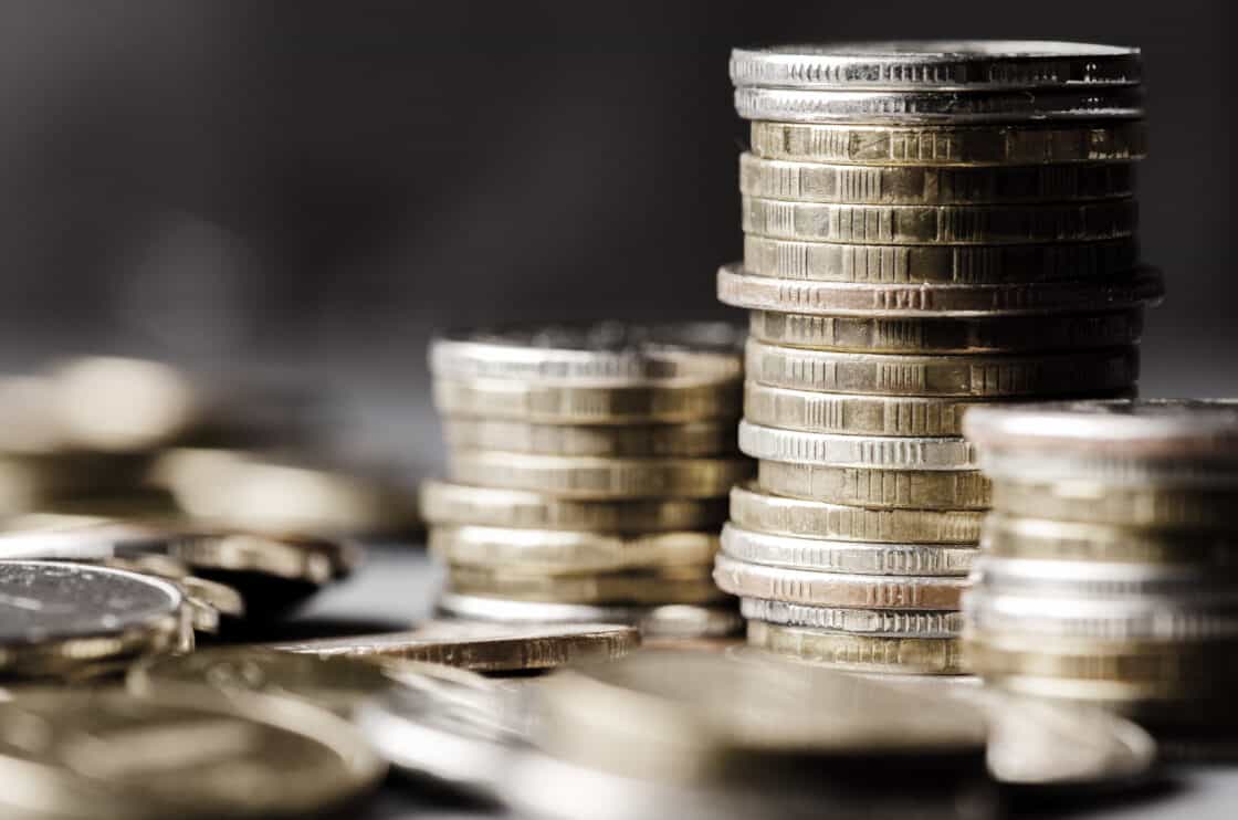lots-of-coins-the-concept-of-investing-or-saving-money-or-a-financial-crisis-copy-space