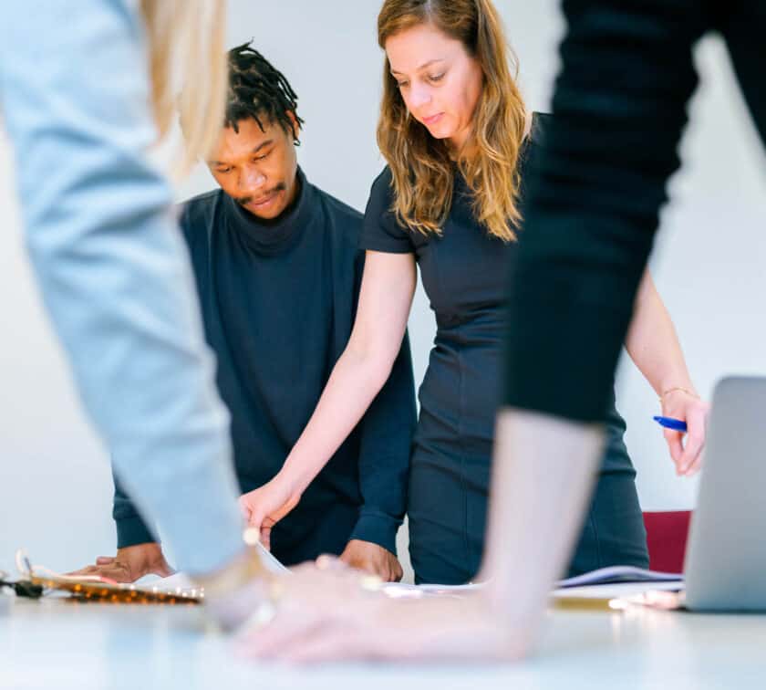 People working together during a meeting.