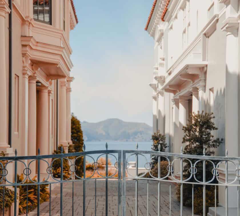 Gates in front of two buildings.