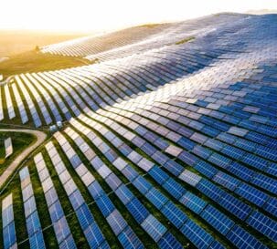 Aerial view of solar panels in a mountain.