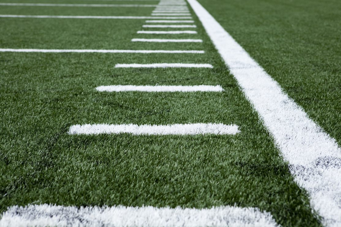 close-up-football-stadium-artificial-grass-and-markings